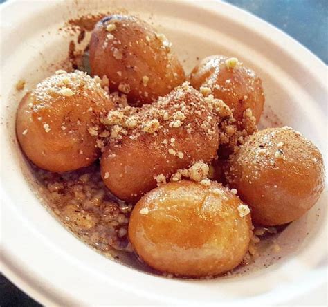 Stir with a whisk until the yeast dissolves completely and wait for 5 minutes. . Loukoumades near me